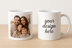 two personalized mugs, one has a picture and the second one that says "your design here"